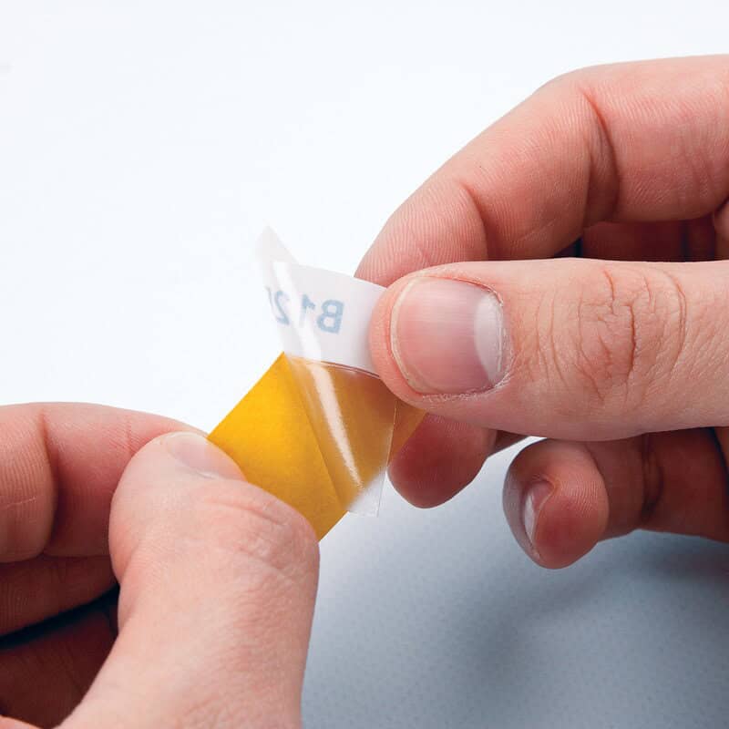 Samo Laminovací štítek, který je odlupován z line ru